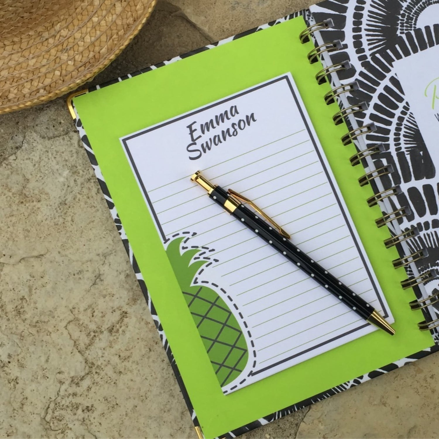 clear adhesive pocket added to inside cover of planner holding a notepad that coordinates with planner in green, black and white
